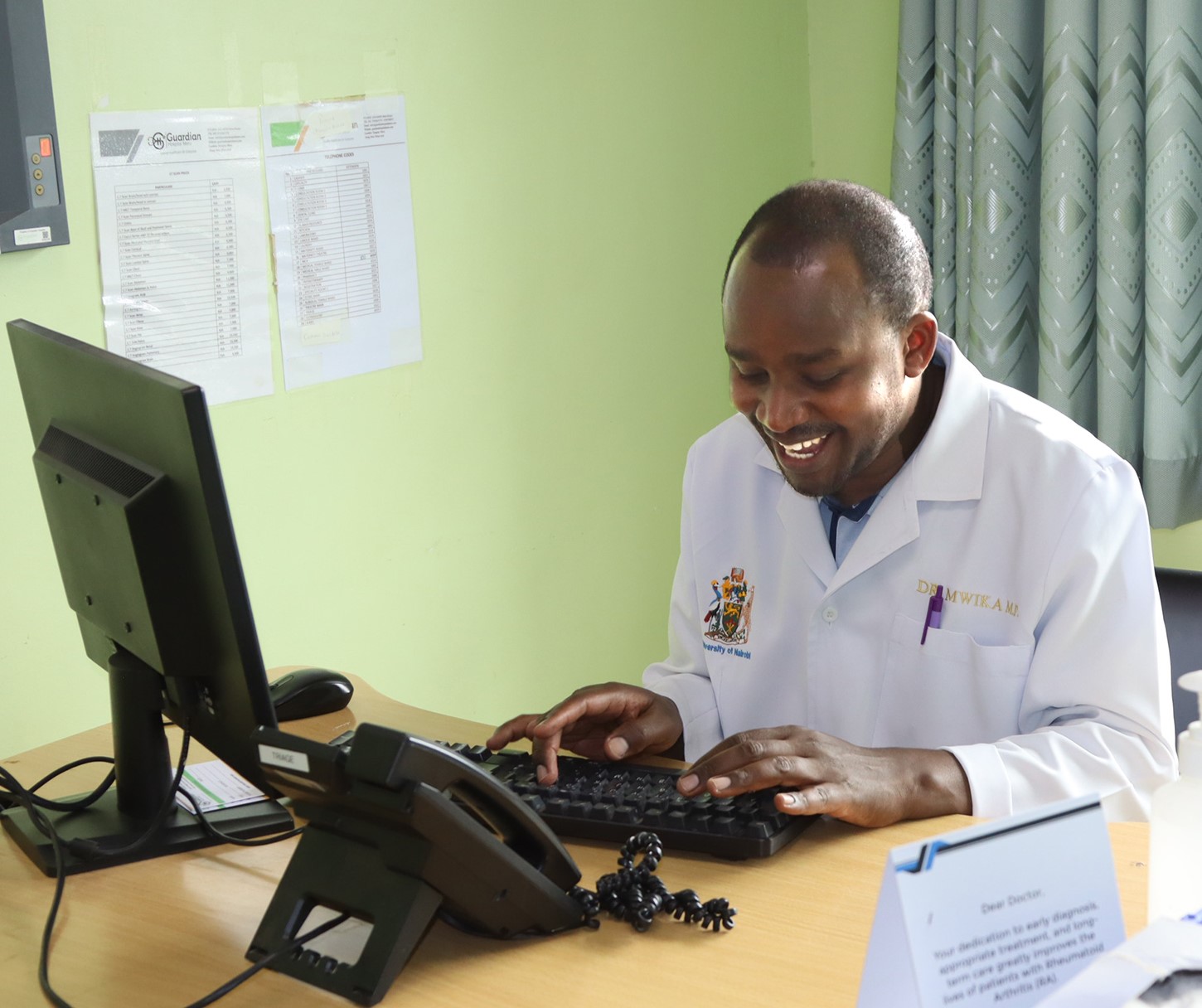 Dr Peter Mwika during academic engagement